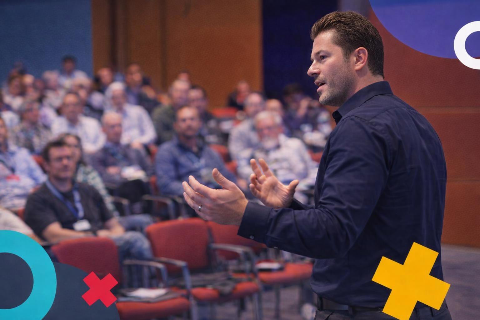 A speaker presenting at a large SEO conference with an engaged audience.