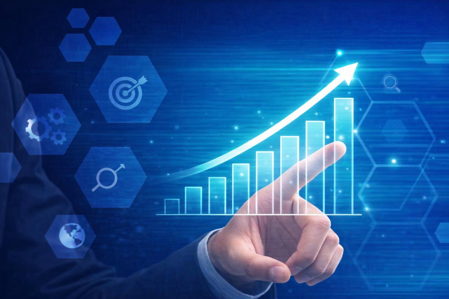 Coach demonstrating techniques to improve website load times on a laptop.